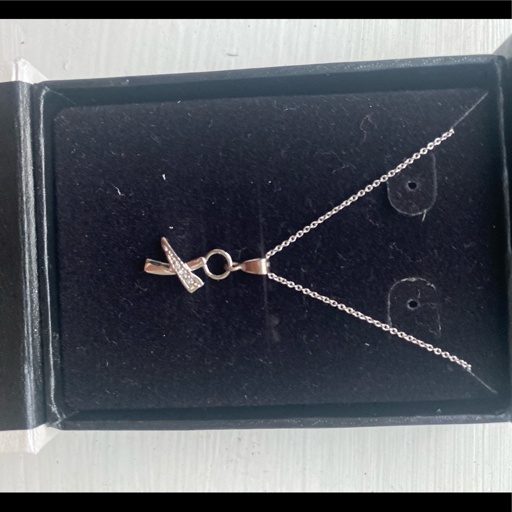 Never worn, Beautiful Sterling Silver X necklace